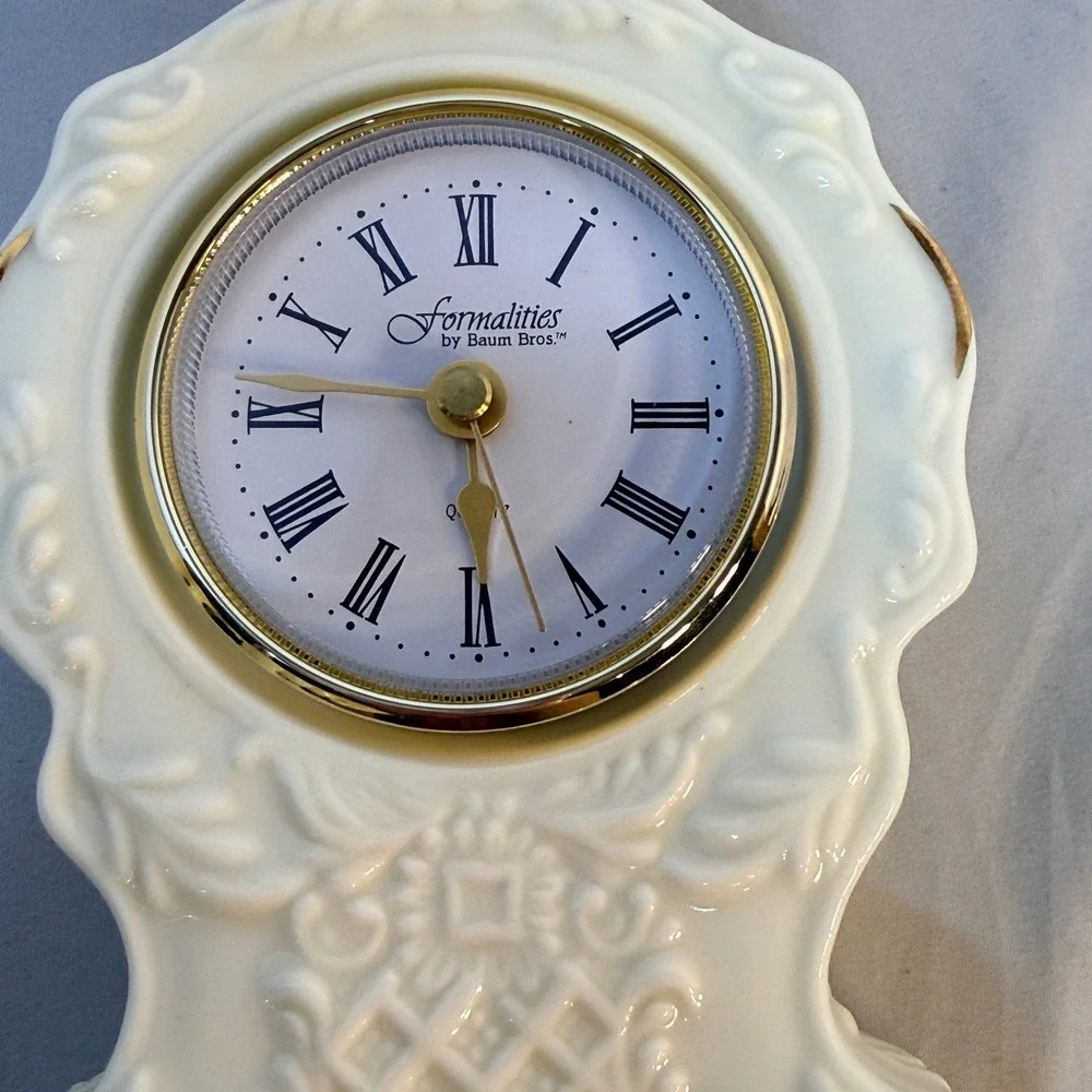 Formalities by Baum Bros Porcelain Mantel Clock Cream Gold Trim Roman Numerals